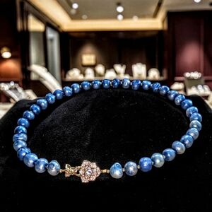 Hand Crafted Blue Pearl Necklace with Golden Floral Clasp